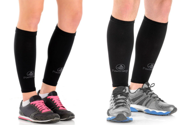 Woman and man wearing PowerStep Compression Socks Performance Sleeves