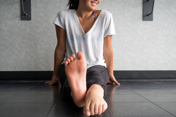 Woman stretching feet and toes