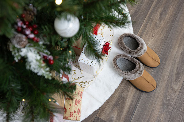 Powerstep winter slippers with arch support under Christmas tree