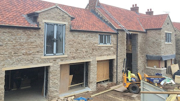 Farmhouse with concrete lintels installed from Naylor