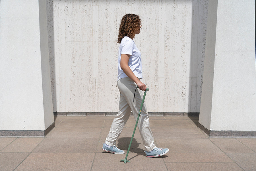 woman walking with cane