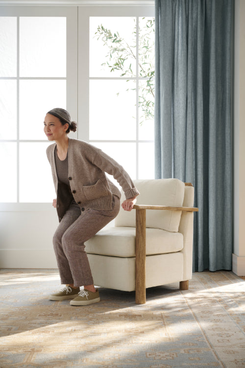 images of woman getting up from a chair