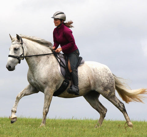 Enjoying a canter out on a hack in a Total Contact Saddle - TCS treeless saddle