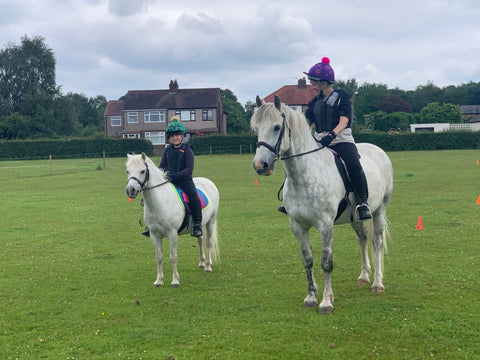 Mum and daughter both riding in their Total Contact Saddles - TCS treeless saddles