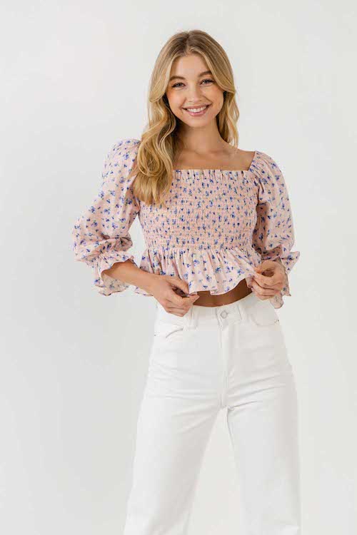 woman in the Blushing Floral Top