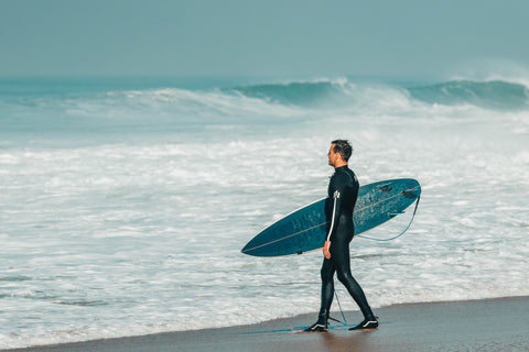 surfer in 4/3mm thick neoprene wetsuit