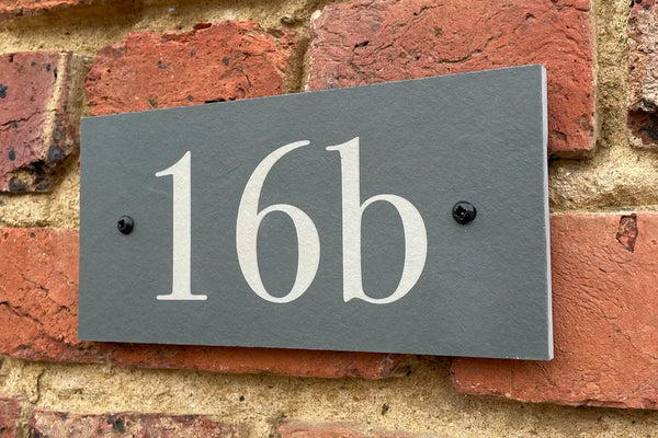 Etched slate house sign