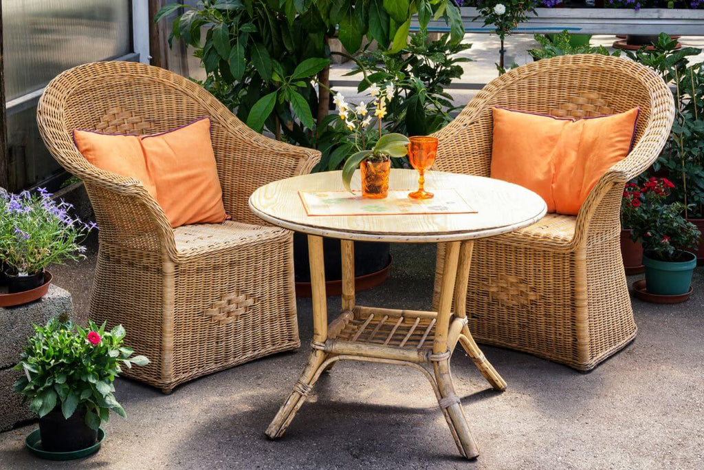 Cozy farmhouse patio with sitting for two