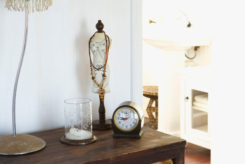 Small clock as dresser decor