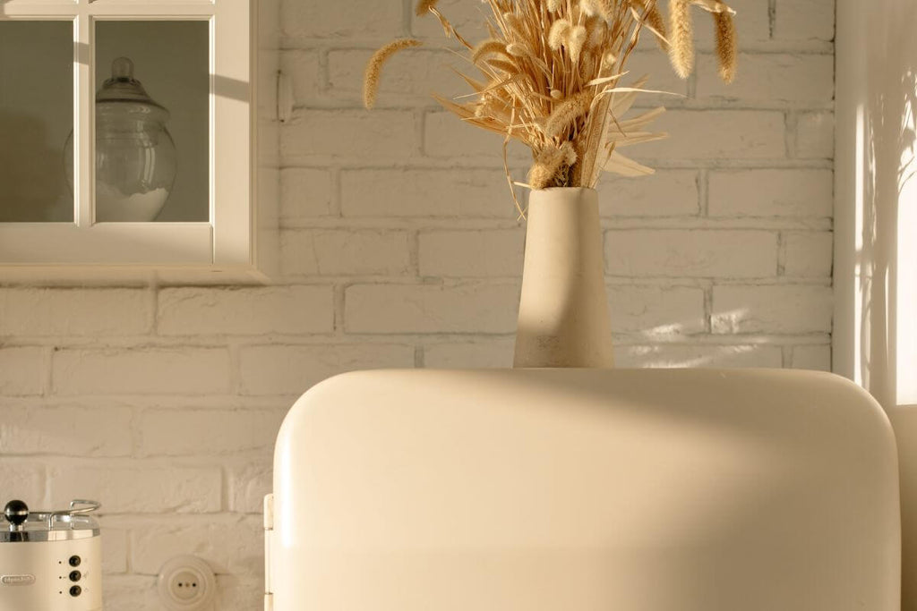 White vase as above fridge top decor ideas