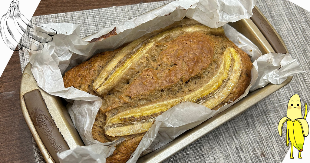 Banana bread with sliced bananas on top