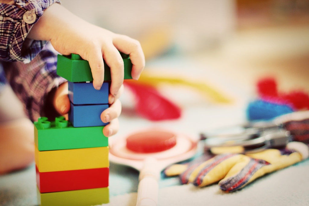 baby playing with blocks