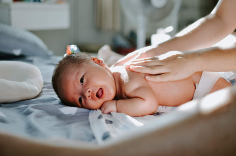 sooth baby during diaper change