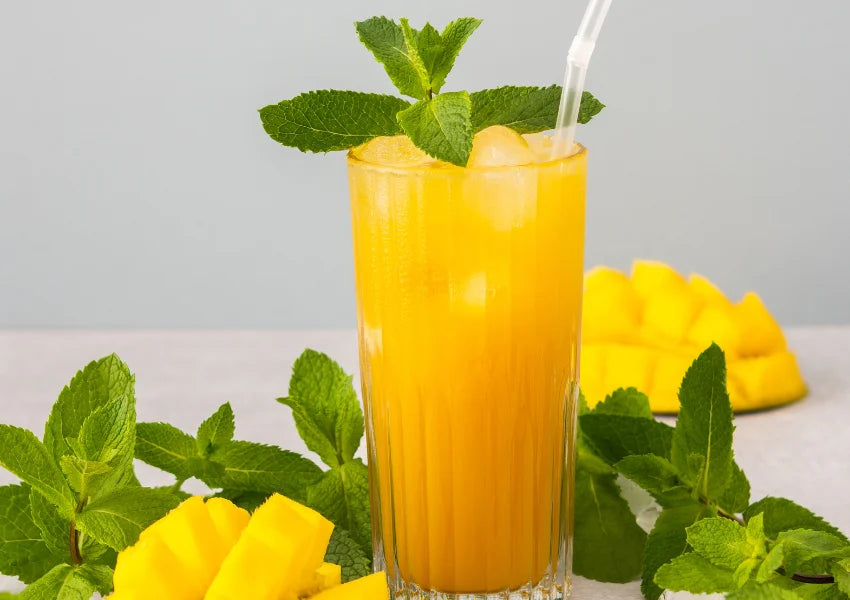 mango juice in a transparent glass