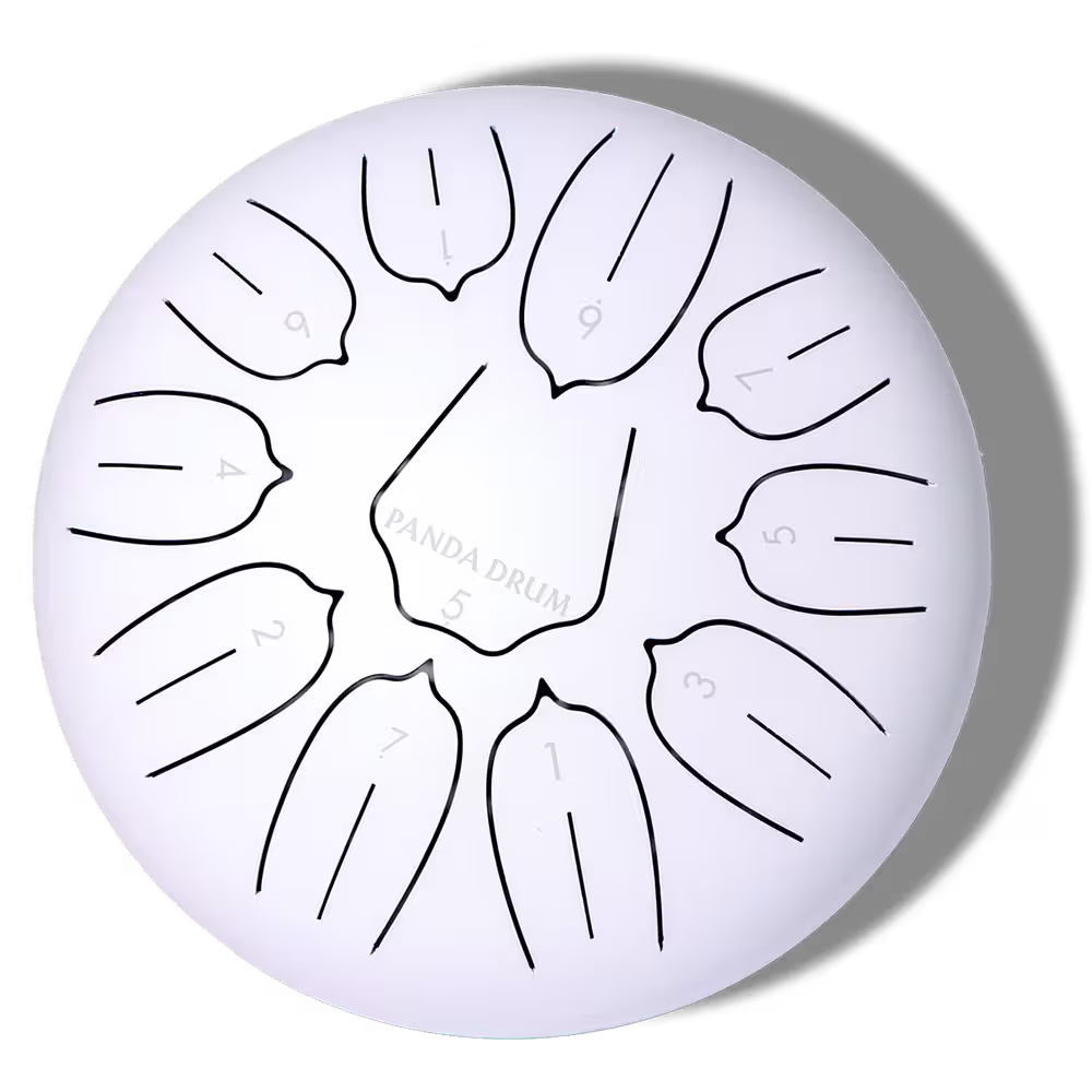 White steel tongue drum with labeled notes on a black background.
