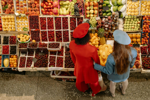 Photo by cottonbro studio: https://www.pexels.com/photo/two-women-buying-fruits-9811518/