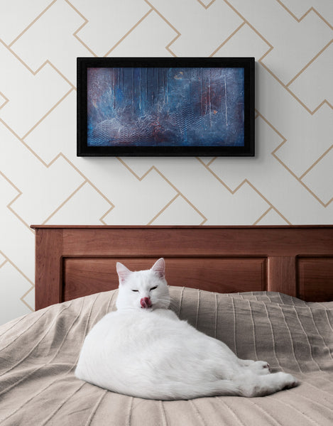 Kimberli Werner Art, original abstract art, image of white cat laying on bed with beige bedspread and brown headboard, painting hanging on wall behind.