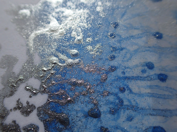 Kimberli Werner Art, work in progress, wavy patterns of encaustic wax in silver and light blue