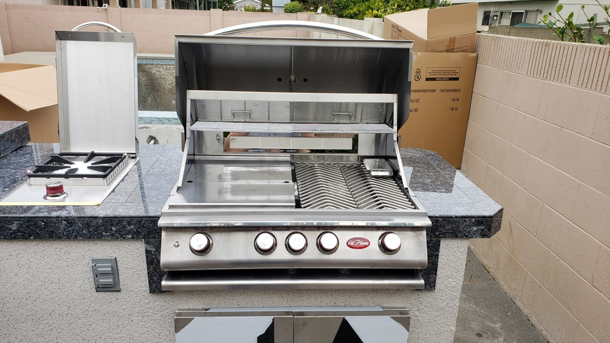 Cal Flame 6 ft. 4-Burner Propane Grill Synthetic Wood and Granite Countertop Grill Island with in Stainless Steel