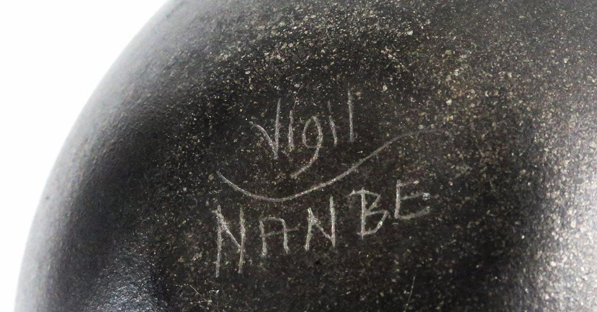 Lonnie Vigil signature on pottery from Nambé Pueblo