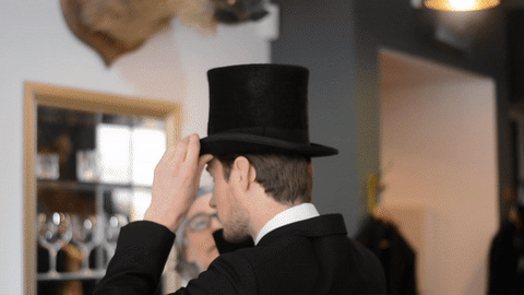 GIF of model being fitted for a top hat at Oliver Brown