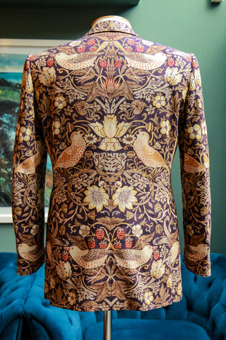 Image of back of bespoke jacket with William Morris' print, "Strawberry Thief".
