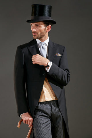Model wearing an Oliver Brown Navy Morning Suit