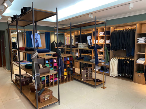 Looking at the Jermyn Street Store from the entrance, showing all the new fittings, rails and clothing hanging up