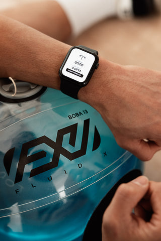 Apple Watch tracking heart rate with Fluid X’s aqua bag - Fluid X