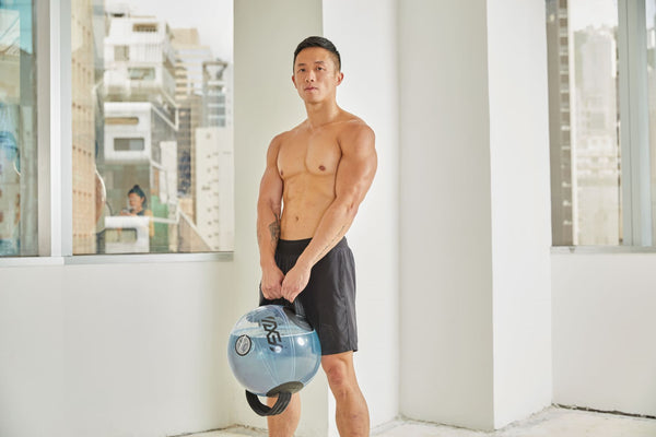 John Chan (JC) - personal trainer Hong Kong with Fluid X’s aqua bag - Fluid X