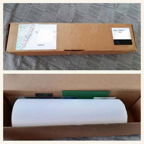 Two images of the same box, ready to post to Greece. First one shows the box from the outside, second one on the inside: there is a print, a thank you note and a sticker.