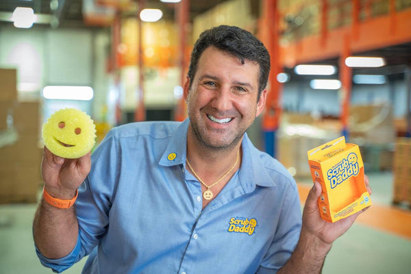 founder of scrub daddy with sponge in his hands