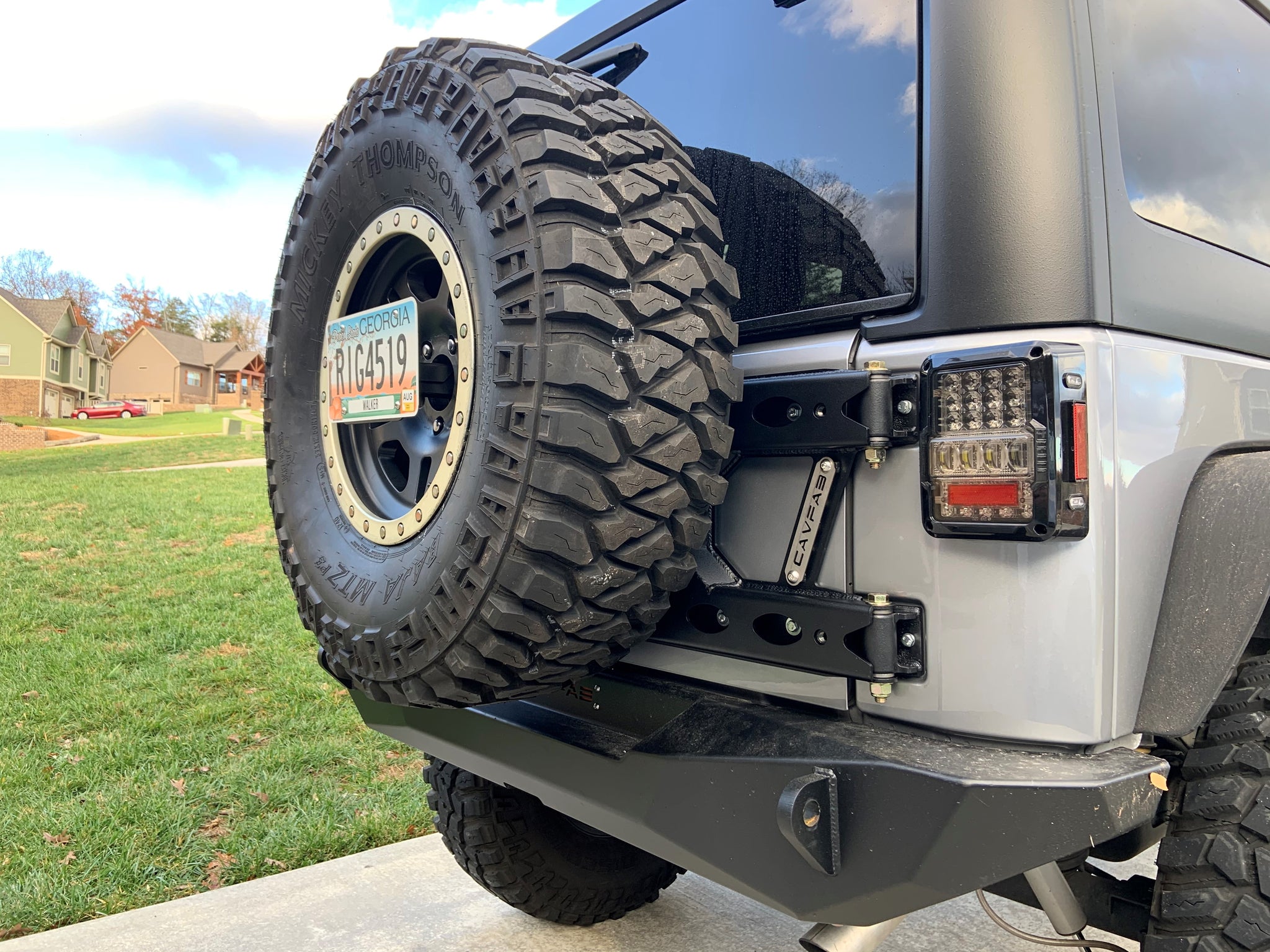 Arriba 71+ imagen jeep wrangler jk tire carrier