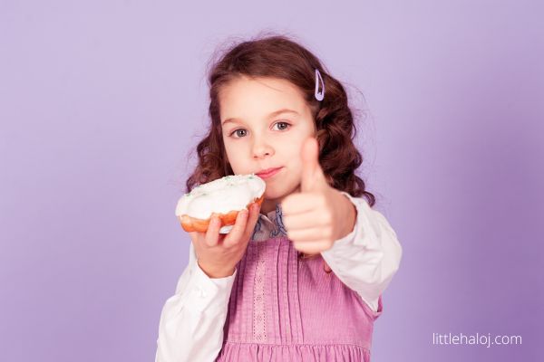 girl eating donut