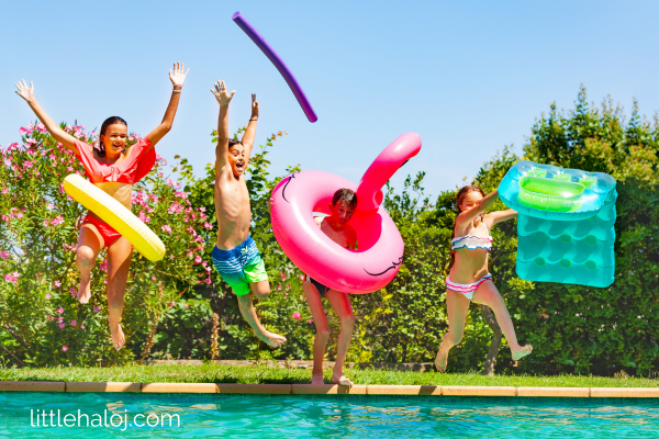 Kids Jumping in the pool at a pool party