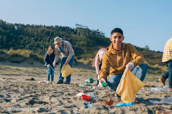 teen collecting litter at local beach