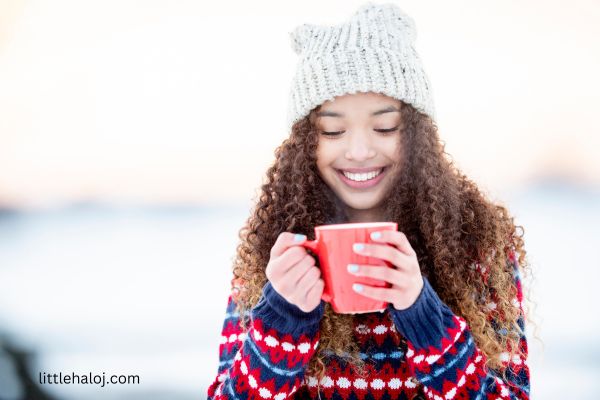 Teen girl drinking hot chocolate