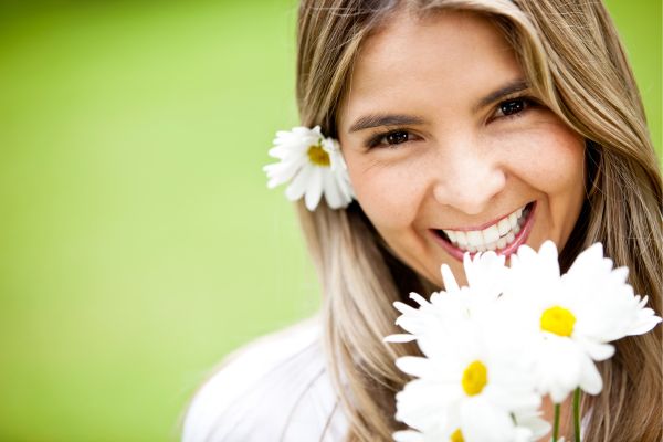 Woman holding Flowers