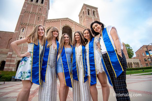 Teenage girl with graduation stole and cords