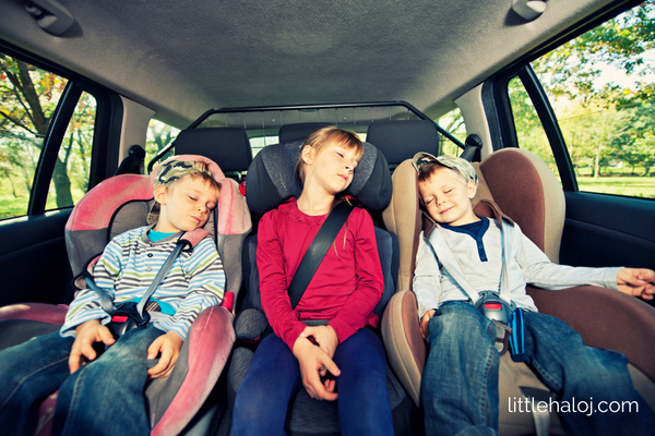 Tired kids on family car trip