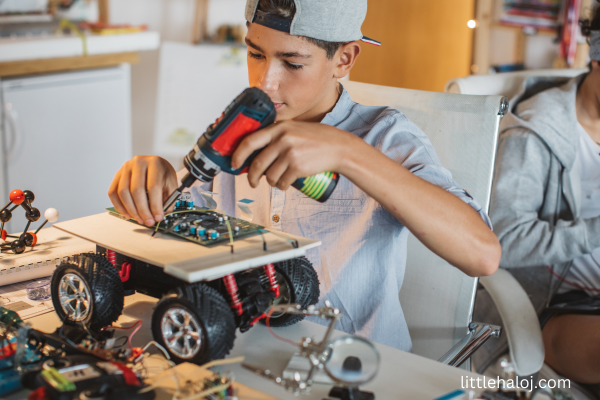Teenager making a Robotic car