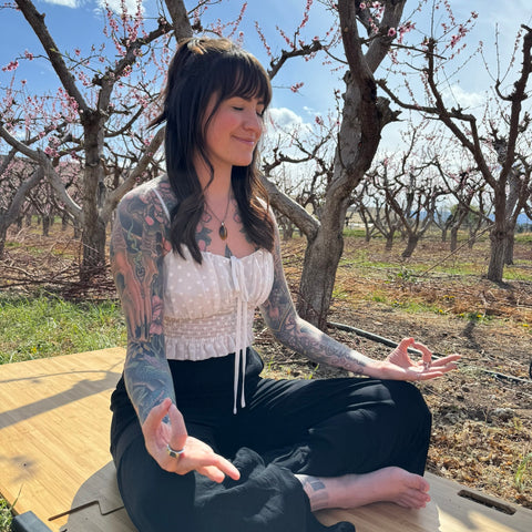 Yoga Mudras for Meditation Natalia with Jnana Mudra in orchard