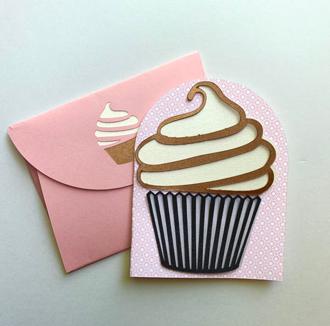 a handmade cupcake card with a matching pink envelope with cupcake detail on the flap
