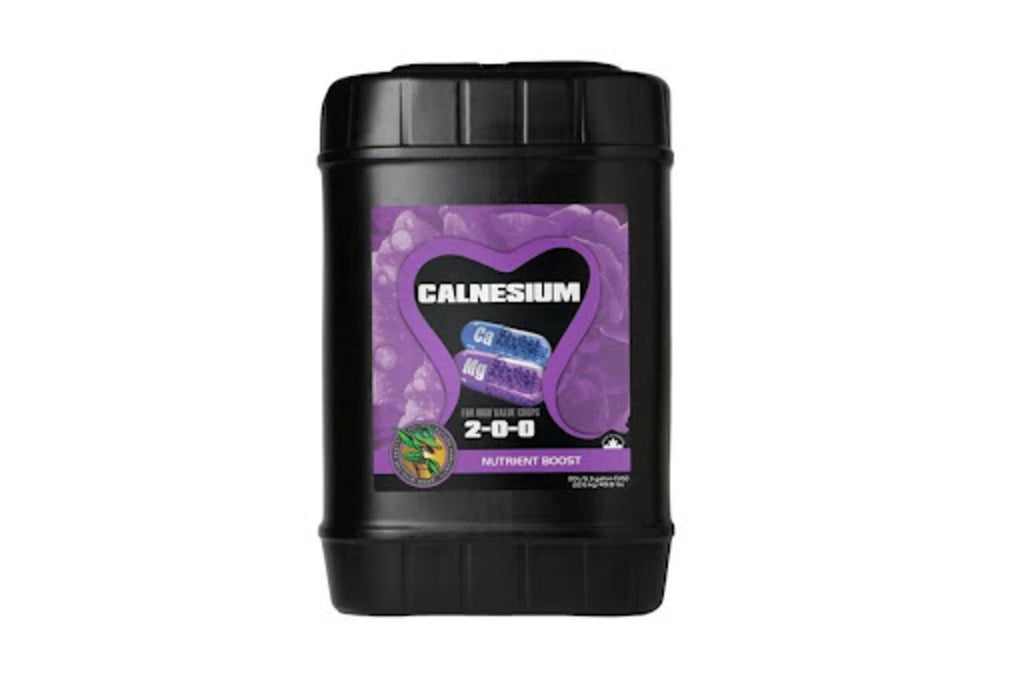 Calnesium in a black bottle with a violet sticker label