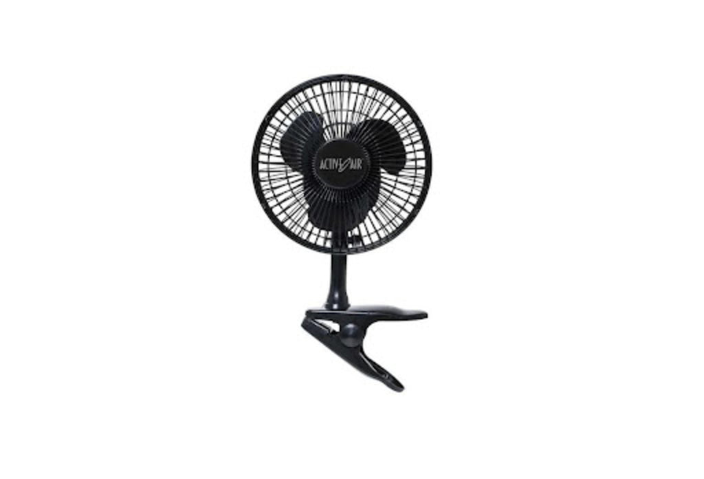 The Active Air Clip Fan in black with the brand name on the blade guard