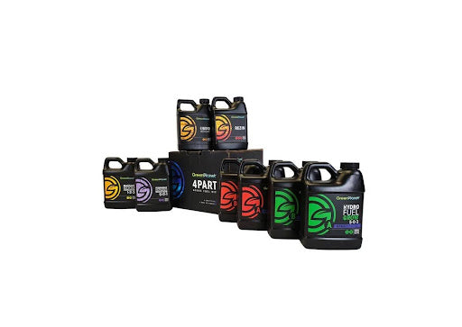 The GreenPlanet Nutrients 4 Part Hydro Fuel Kit with a black box surrounded by eight bottles on hydroponic nutrients