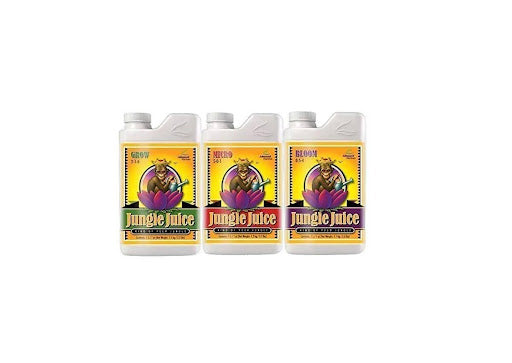 three Advanced Nutrients Jungle Juice series bottles with an illustration of a monkey wearing a crown while watering a big flower