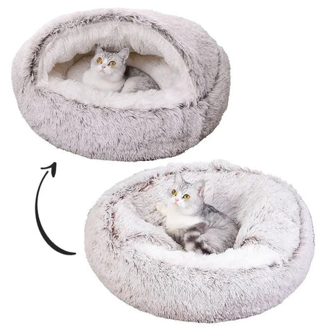 cat inside a cat cave bed with versatile cover