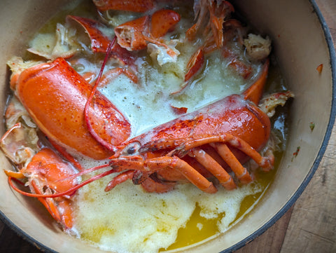 Lobster shells cooking in butter with lemon juice