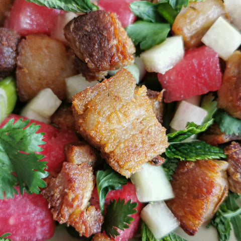 Close up shot of Crispy Rillon and Pickled Watermelon Salad